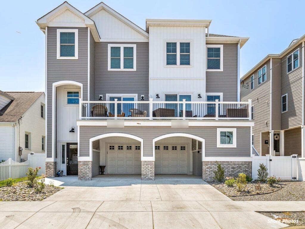 Finished home with two garages and a covered balcony